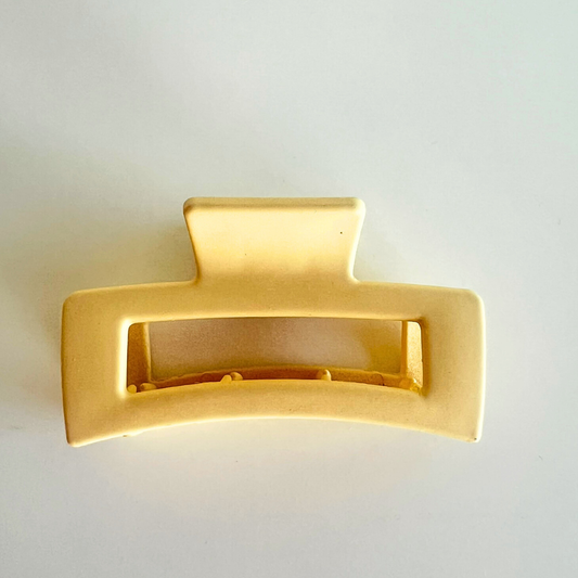 Rechte haarklip in lichtgeel