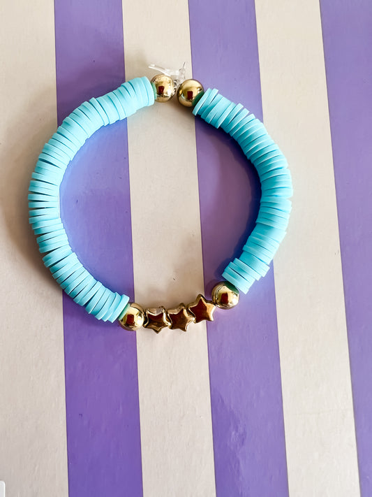 Stella Armband – Lichtblauw & Goud met Drie Fonkelende Sterren